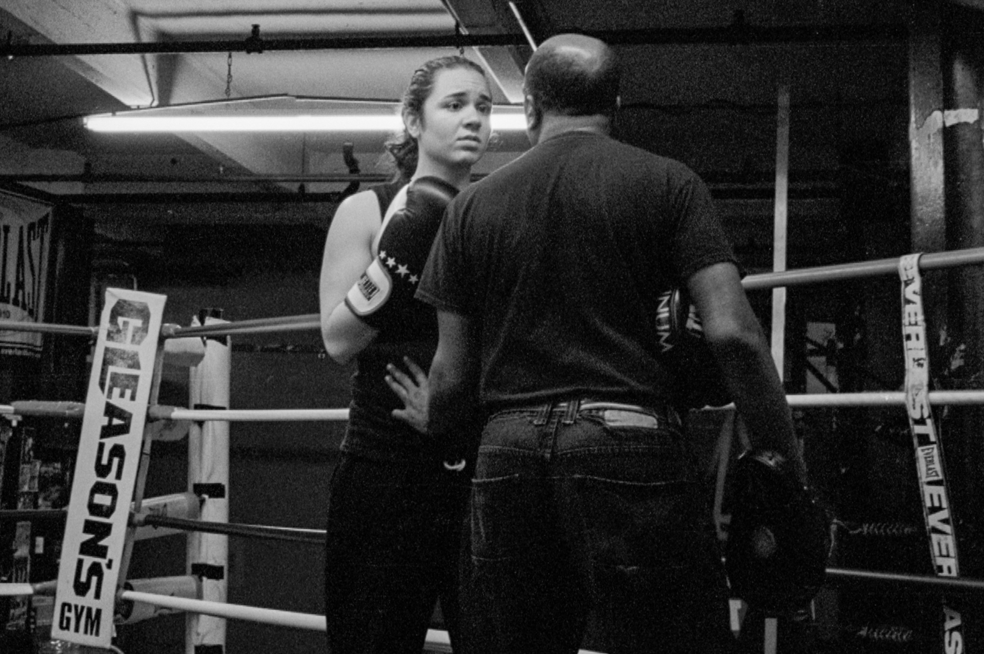 a boxer speaking her coach